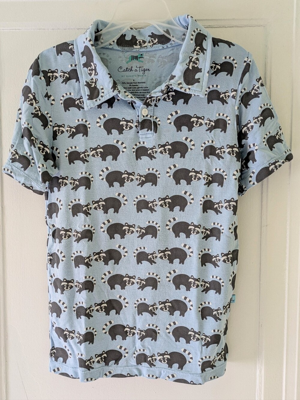 Catch a Tiger brand raccoon polo